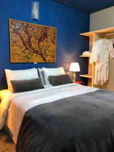 Ένα ή περισσότερα κρεβάτια σε δωμάτιο στο Relais Amadeus Pousada de Charme