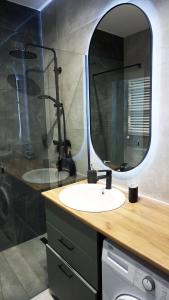 Een badkamer bij Apartament 47 Letnica