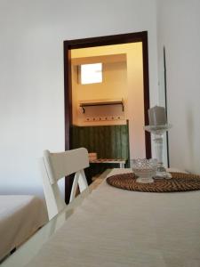 เตียงในห้องที่ B&B Salvatore Lido di Noto