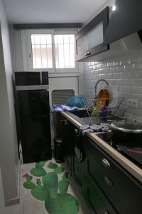 Kuchyň nebo kuchyňský kout v ubytování T2 à Sérignan Hérault