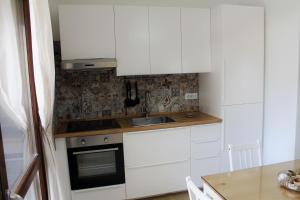 Kuchyňa alebo kuchynka v ubytovaní Casa Angelina Deluxe Suite