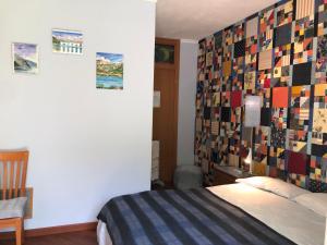 Postel nebo postele na pokoji v ubytování B&B L'erica