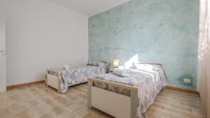 Voodi või voodid majutusasutuse Apartment Mikao - Torre Pali toas