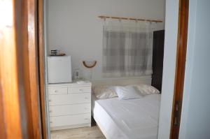 Postel nebo postele na pokoji v ubytování Soba Mira + 9 fotografií