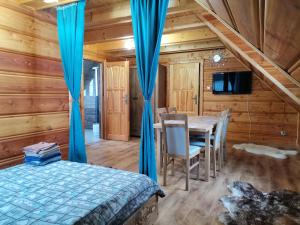 Posteľ alebo postele v izbe v ubytovaní uDany Villa Apartament
