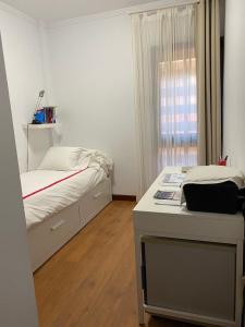 Posteľ alebo postele v izbe v ubytovaní apartamento Jacaranda centro