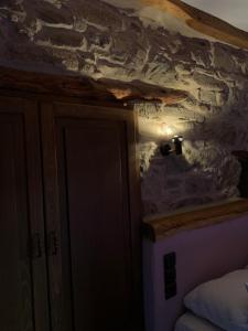 Postel nebo postele na pokoji v ubytování Lithos Homes