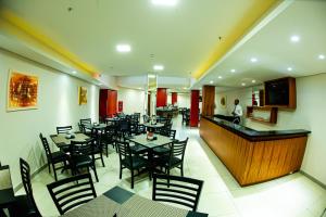 Un restaurante o sitio para comer en Hotel Nacional Inn Porto Alegre - Próximo ao Complexo Hospitalar Santa Casa e UFRGS