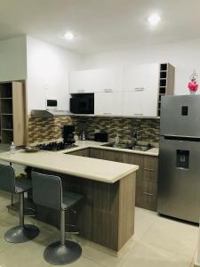 Η κουζίνα ή μικρή κουζίνα στο Puerto Morelos - House to enjoy Riviera Maya