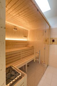 a bathroom with a shower and a sauna at Luna Arcos Hotel Nature & Wellness in Arcos de Valdevez