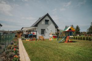 Herní místnost nebo prostor pro děti v ubytování Domek nad morzem - Trzęsacz