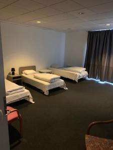 Katil atau katil-katil dalam bilik di Skuldelev kro