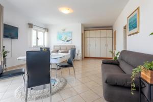 Posezení v ubytování Apartments Jakic 1