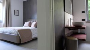 Posteľ alebo postele v izbe v ubytovaní In Collina B&B
