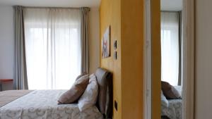 Posteľ alebo postele v izbe v ubytovaní In Collina B&B
