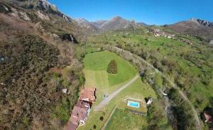 an aerial view of a house on a mountain at Les Vegues II in Santillán