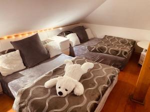 Postel nebo postele na pokoji v ubytování Apartment Neratovice