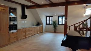 Kuchyň nebo kuchyňský kout v ubytování Apartamenty Ceglane