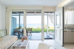 A balcony or terrace at Junior suite by the beach Stalida