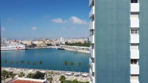 a view of a large body of water from a building at Malagueta & Port in Málaga