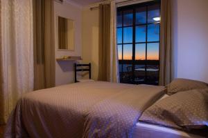 Postel nebo postele na pokoji v ubytování Wonderful View