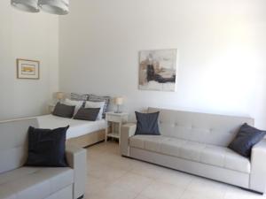 Posezení v ubytování APC Apartamento Palmela Village