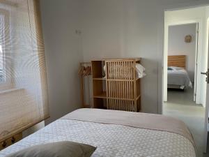 Postel nebo postele na pokoji v ubytování Casa da Avó