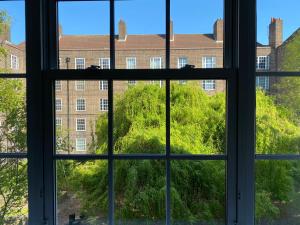 a view from a window of a building at London Waterloo Apartment in London