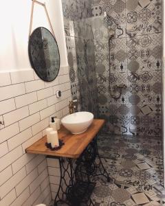 a bathroom with a sink and a shower at Siedlisko Besarabka in Czernikowo +47 photos