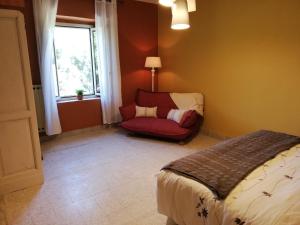 A bed or beds in a room at Casa Bellocchio