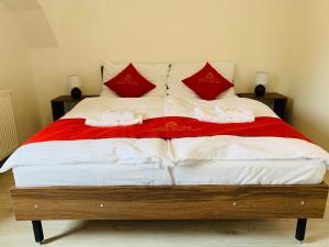 Łóżko lub łóżka w pokoju w obiekcie Pension VIDHOUS 2