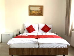 Łóżko lub łóżka w pokoju w obiekcie Pension VIDHOUS 2