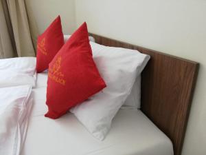 Łóżko lub łóżka w pokoju w obiekcie Pension VIDHOUS 2