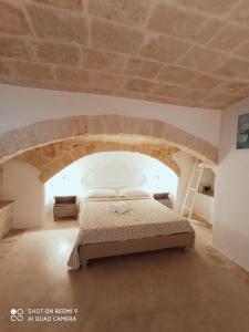 Posteľ alebo postele v izbe v ubytovaní B&B La Porta Vecchia