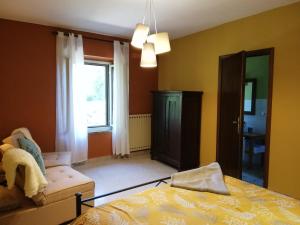 A bed or beds in a room at Casa Bellocchio