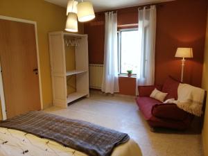 A bed or beds in a room at Casa Bellocchio