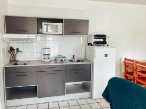 Kjøkken eller kjøkkenkrok på Les Pastourelles