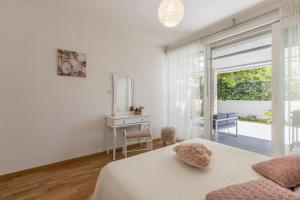 Posteľ alebo postele v izbe v ubytovaní Apartment TIKI with big terrace