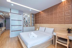 Giường trong phòng chung tại 22housing Hotel & Residence 81 Linh Lang