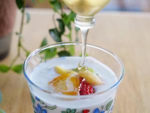 a drink with a spoon in a cup with a strawberry at Pension KUROSHIOMARU in Setouchi +50 photos