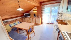 TV a/nebo společenská místnost v ubytování Guesthouse Schoba Typ D