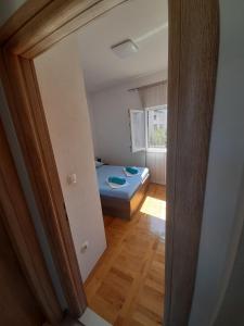 Postel nebo postele na pokoji v ubytování Apartment Luce