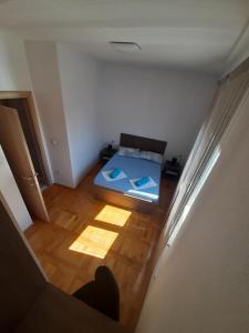 Postel nebo postele na pokoji v ubytování Apartment Luce