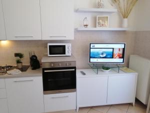 Kuchyň nebo kuchyňský kout v ubytování Casa Roberto