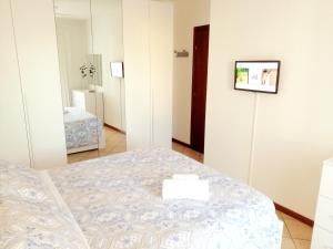 Postel nebo postele na pokoji v ubytování Casa Roberto