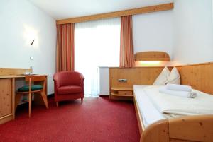 Postelja oz. postelje v sobi nastanitve Gasthof Hotel Schermer