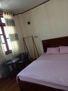 Postel nebo postele na pokoji v ubytování Minh Toàn Homestay