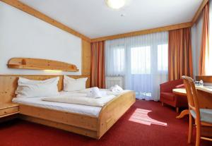 Postelja oz. postelje v sobi nastanitve Gasthof Hotel Schermer