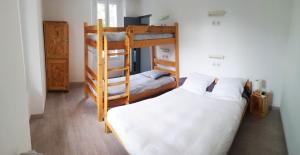 Postel nebo postele na pokoji v ubytování Icerock Hotel