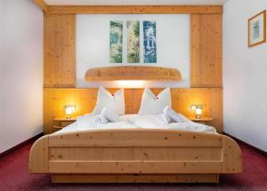 Postelja oz. postelje v sobi nastanitve Gasthof Hotel Schermer